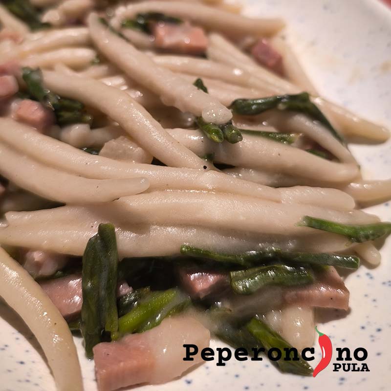 Best homemade pljukanci with asparagus aond Istrian prosciutto sauce in Pula