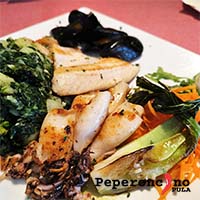 The best boneless fish platter in Pula – grilled sea bass fillet, shrimp, baby squid and grilled mussels, served with traditional Swiss chard and potatoes. A perfect choice for lovers of fresh Adriatic seafood and Mediterranean cuisine.