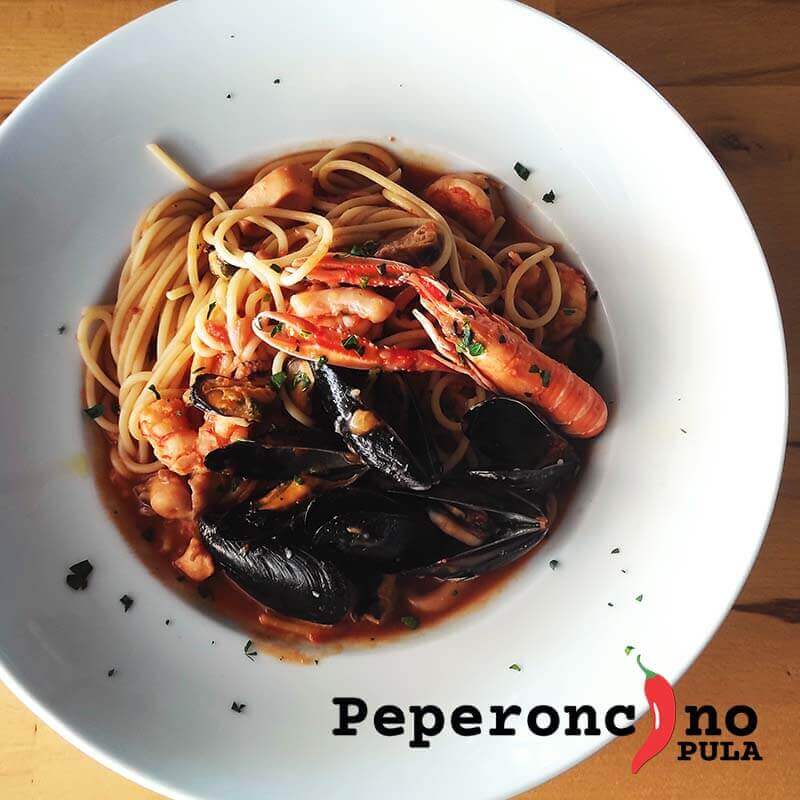 Best pasta with seafood sauce Spaghetti allo scoglio picante in Pula